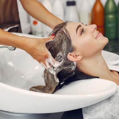 woman-washing-head-hairsalon_1157-27179-2