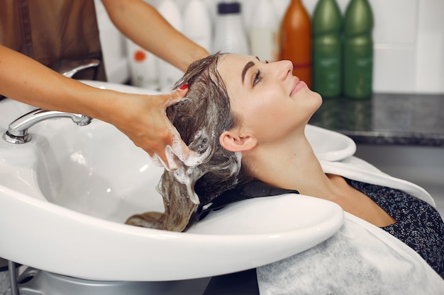 woman-washing-head-hairsalon_1157-27179